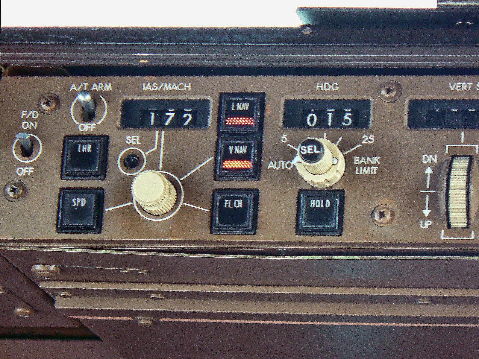 Aircraft autopilot flight control panel with heading and speed dials