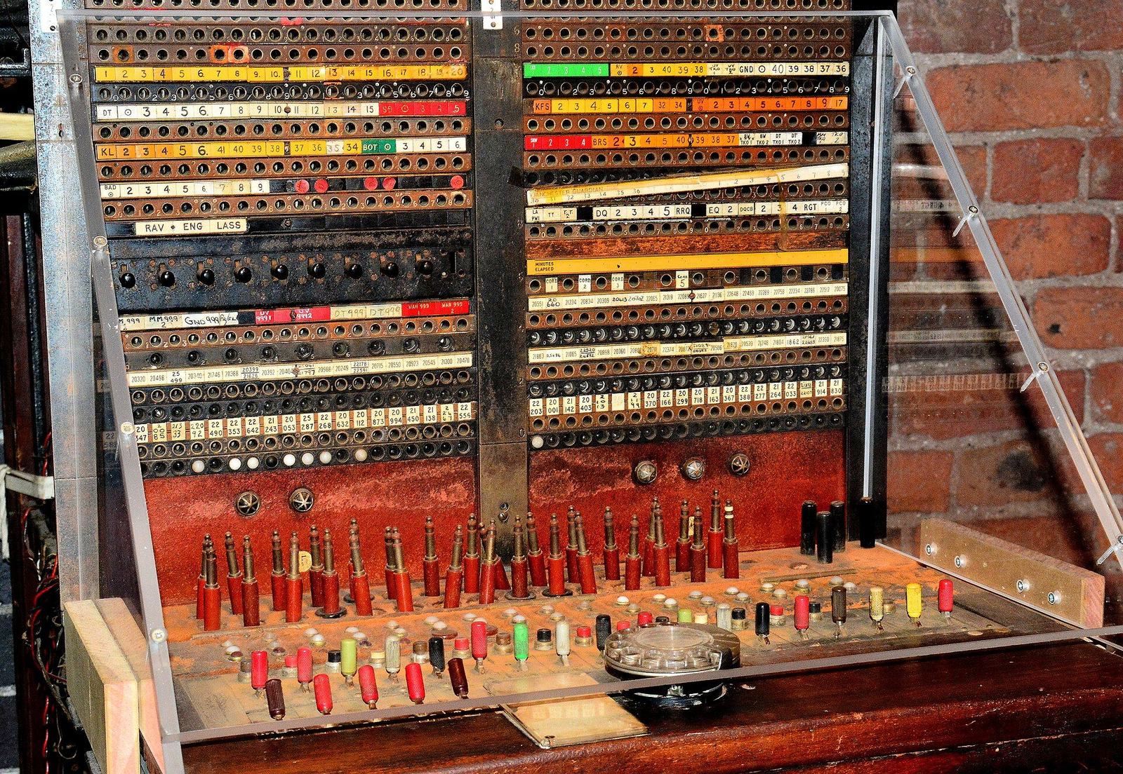 Vintage telephone switchboard with jacks and patch cords