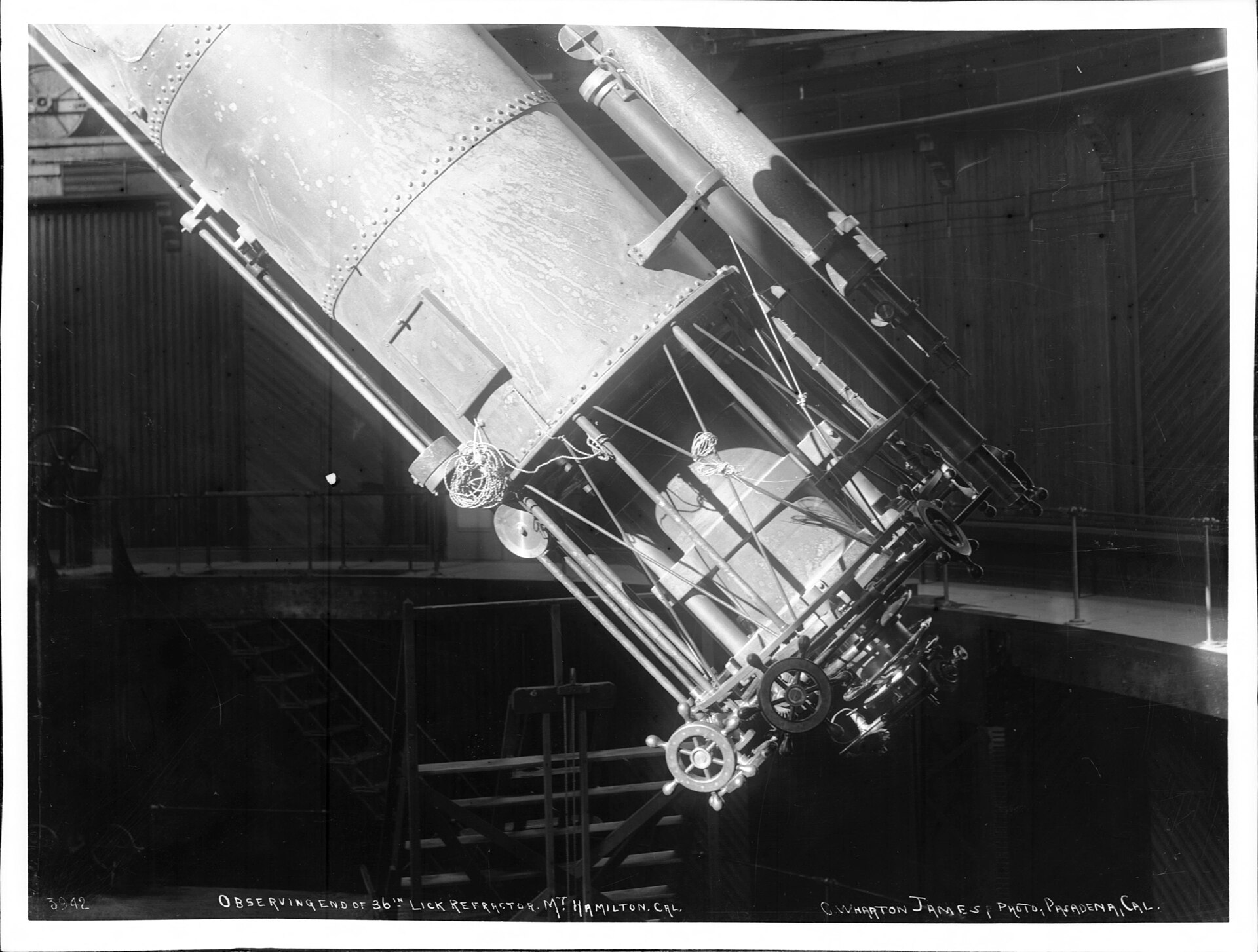 The great refracting telescope inside the dome of the Lick Observatory in the early 1900s
