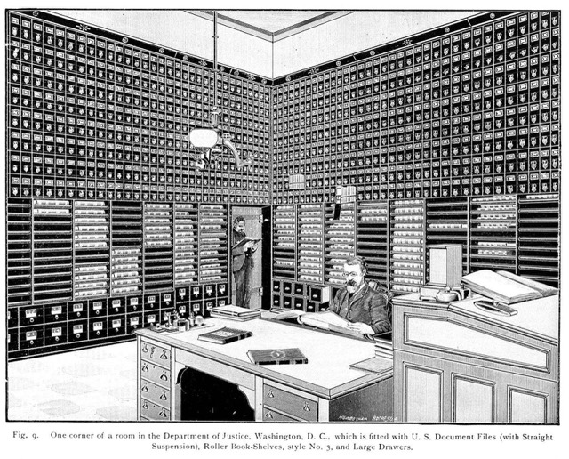 An engraving of a room lined floor to ceiling with document files at the Department of Justice in 1892, a clerk at a desk