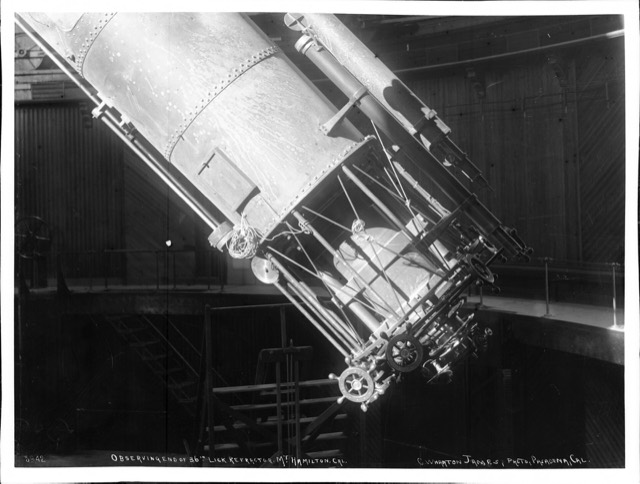 The great refracting telescope inside the dome of the Lick Observatory in the early 1900s