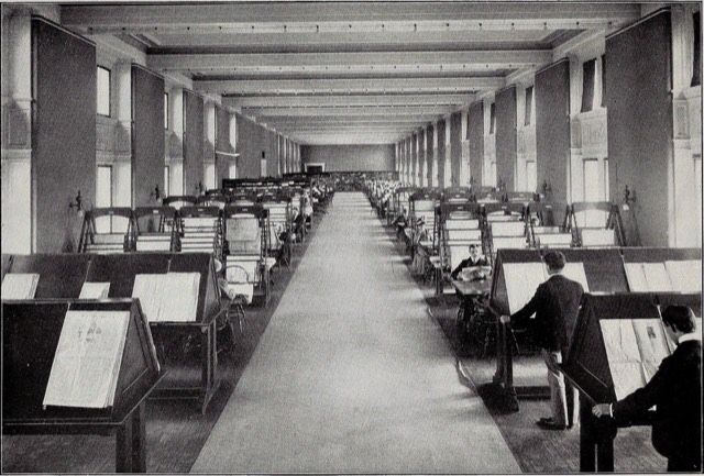 A long reading room at the Library of Congress in 1901, with newspapers and periodicals on sloping stands